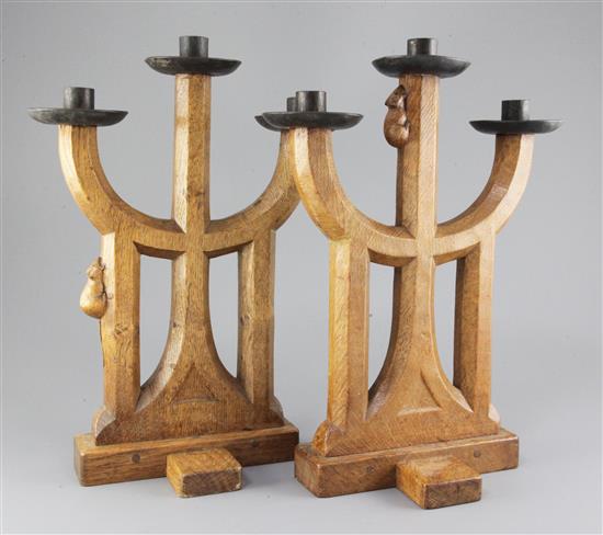 A pair of Robert Mouseman Thompson oak candelabra, 15in.